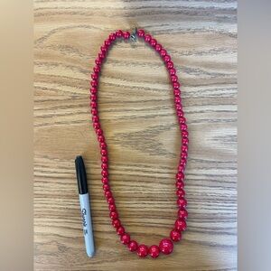 Red bead costume jewelry necklace - sharpie for size